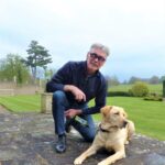 Royalties from footballer’s book helps guide dogs