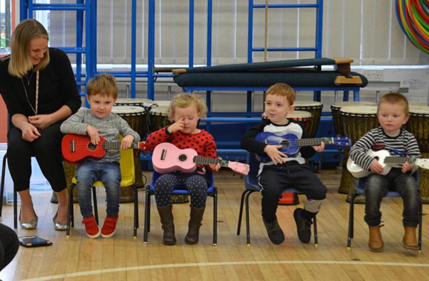 Mini-musicians perform ukulele concert