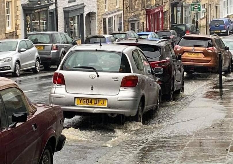 Raw sewage gushed down the main road