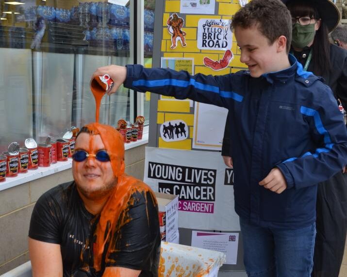Supermarket staff help raise more than £1,000 for cancer charity