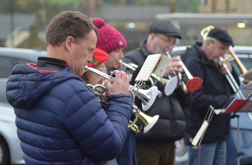 Barney band tunes up for a blast of brass