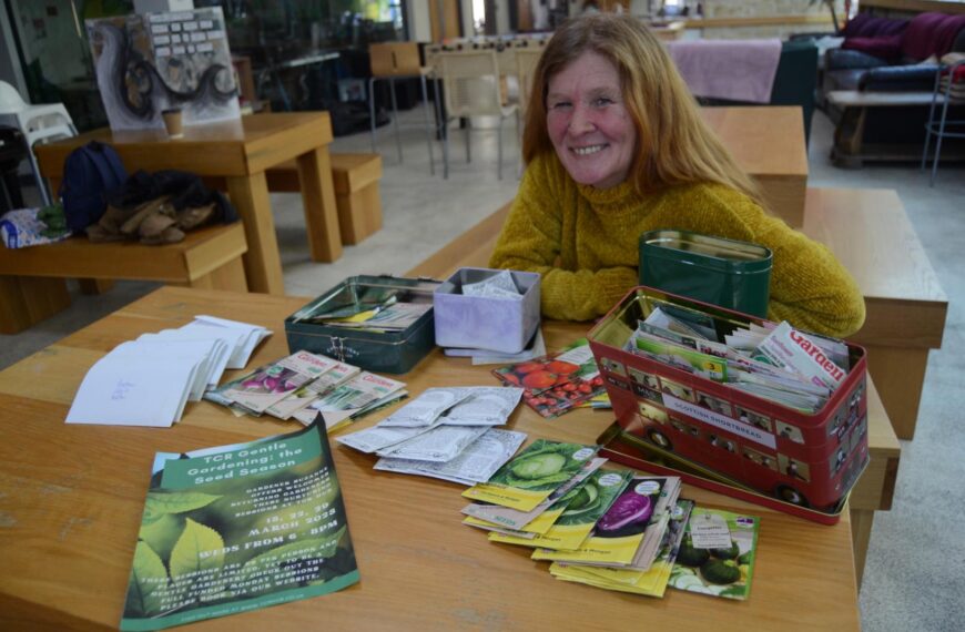 Gardener sows seeds of grow your own food