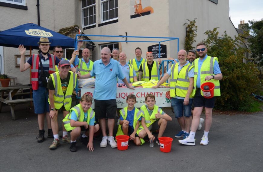 Eight-mile bed push raises cash for charity