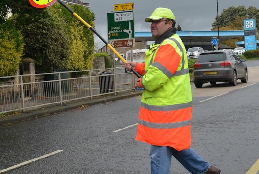 Hit-and-run driver hunted after lollipop man is injured