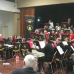 Barney Band’s festive concert at packed club