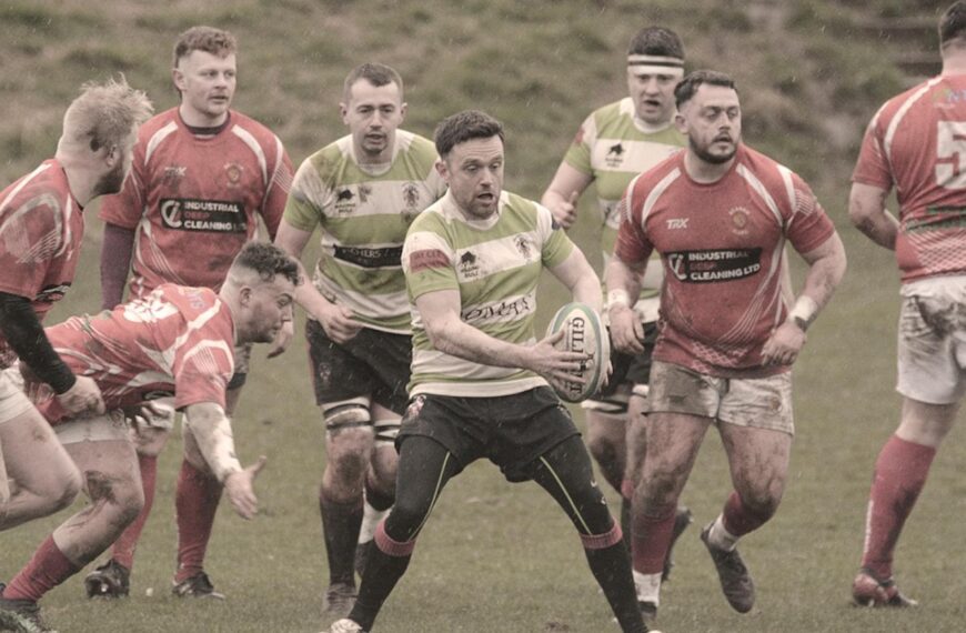 Rain-soaked victory earns bonus point