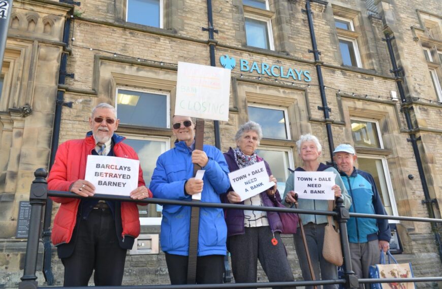 Protesters ‘mourn’ loss of last bank branch