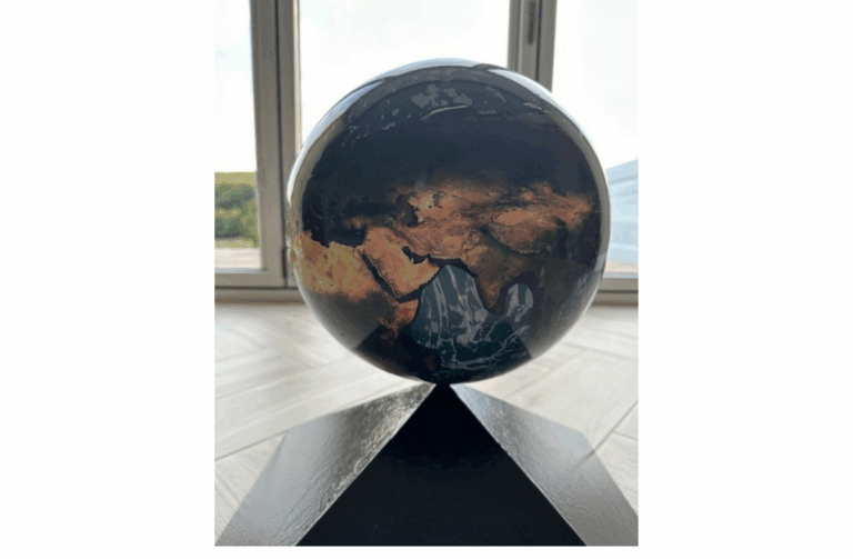 School on top of world after symbol reinstated on roof